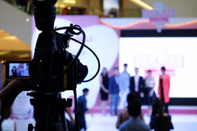 photographer-video-recording-activity-within-event-stage-768x512